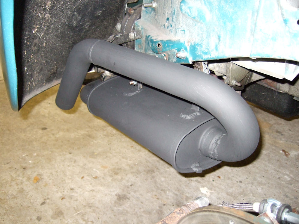 Exhaust installed wheel well